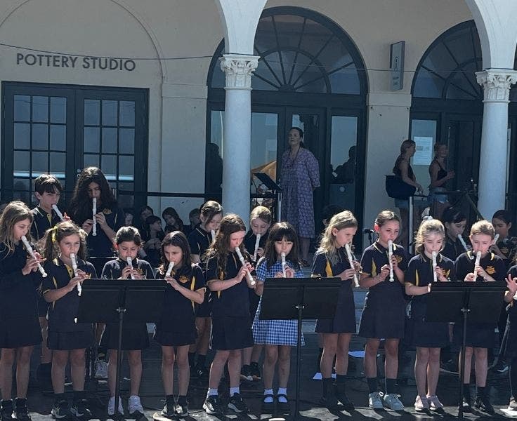 Photo of the recorder group playing at Festival of the Winds.