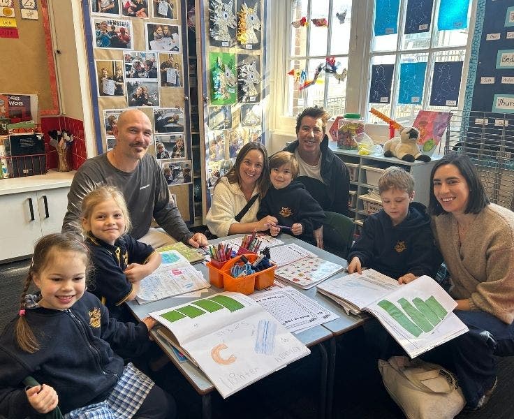 Photo of kindergarten students and their grandparents or special guests taken during Grandparents Day.